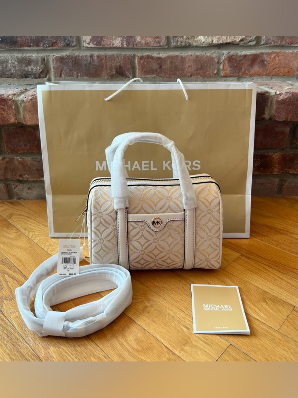 Michael Kors Ivory & Gold Travel Small Duffle Crossbody - Picture 3 of 14